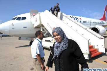 A Turkish Airlines passenger plane landed in Tripoli Saturday noon to become the first international commercial flight to arrive in the Libyan capital since the establishment of a no-fly zone...