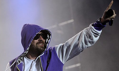epa02295376 German rapper Sido performs on the main stage during the Gampel Open Air Festival in Gampel, Switzerland, 31 August 2010. EPA/JEAN-CHRISTOPHE BOTT