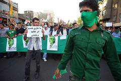 Iranian supporters of defeated reformist presidential candidate Mir Hossein Mousavi demonstrate on June 17, 2009 in Tehran, Iran.