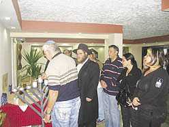 Rabbi Chaim Azimov stands with visitors at the Chabad House in North Cyprus.
