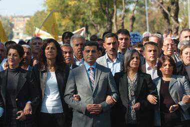 Led by senior Kurdish politicians such as Selahattin Demirtas (center), co-chair of the pro- Kurdish Peace and Democracy Party (BDP), thousands of Turkish Kurds hold a protest march to the courthouse in Diyarbakir, southeast Turkey, on November 11. Kurds in Turkey may be seeing a change, as the study of the Kurdish language is now a graduate-level program there.  Scott Peterson / Getty Images