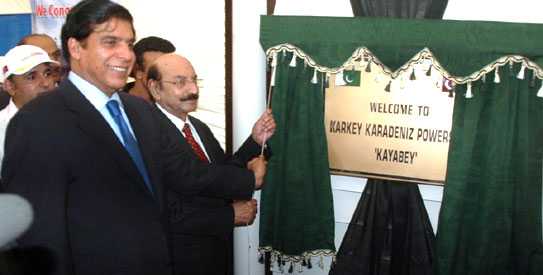 Sindh Chief Minister Syed Qaim Ali Shah and Federal Minister for Water and Power Raja Pervaiz Ashraf unveiling the plaque to inaugurate the first rental power plant at the Karachi Port Trust. – APP Photo Sindh Chief Minister Syed Qaim Ali Shah and Federal Minister for Water and Power Raja Pervaiz Ashraf unveiling the plaque to inaugurate the first rental power plant at the Karachi Port Trust. – APP Photo