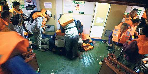 Israeli commandos stormed the Gaza bound Mavi Marmara aid ship and killed one American and eight Turkish activists, triggering a diplomatic crisis between Turkey and Israel.