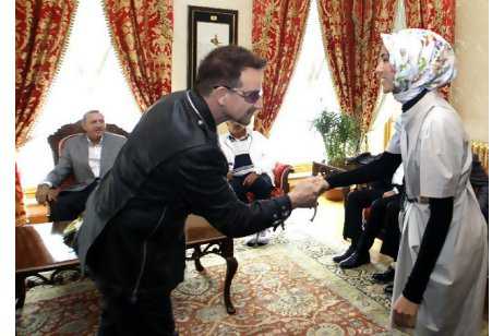 The U2 frontman Bono is greeted by Sumeyye Erdogan, the Turkish prime minister Recep Tayyip Erdogan's daughter, in Istanbul in September.  IBRAHIM USTA / POOL PHOTO