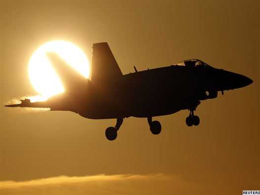 A Canadian CF-18A fighter prepares to land at the Birgi NATO Airbase in Trapani on the southern island of Sicily. A Canadian CF-18A fighter prepares to land at the Birgi NATO Airbase in Trapani on the southern island of Sicily.