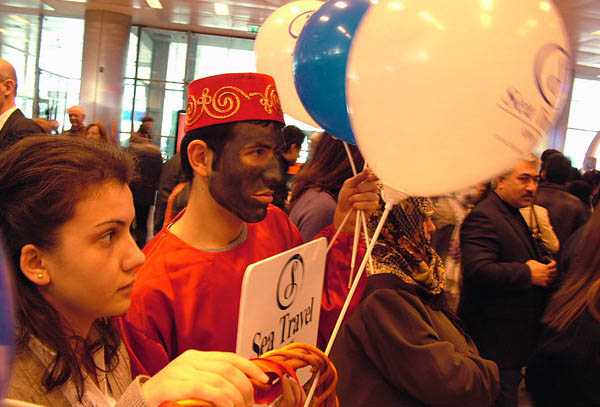 A man dressed up as Hajji Firuz, the embodiment of the Iranian new year, waits at Istanbul Airport to greet arrivals from Tehran. 