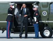 President Barack Obama salutes as he steps off Marine One helicopter before his departure from Los Angeles International airport in Los Angeles, Friday, April 22, 2011. (AP Photo/Pablo Martinez Monsivais)