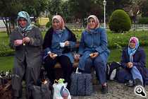 ISTANBUL DAILY LIFE Women take a tea and breakfast break in Sultanahmet Square while visiting Istanbul. Turkish women's groups are united behind an initiative to place women who wear headscarves high enough on electoral lists to be chosen in the upcoming Turkish parliamentary elections. (Photo: Dean C.K. Cox)