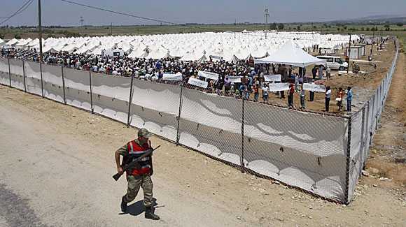 24 reported slain in Syrian protests