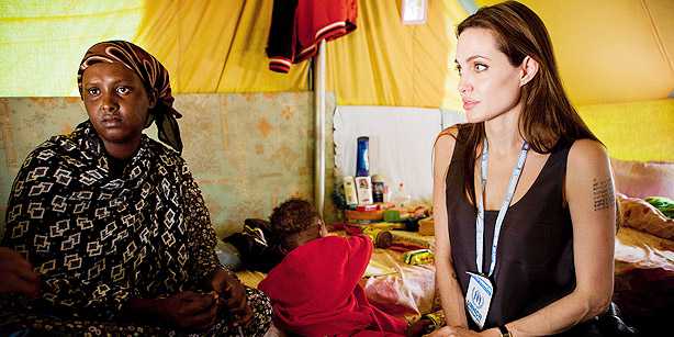 UN High Commissioner for Refugees goodwill ambassador Angelina Jolie visits Somali refugees at Shousha camp at Ras Djir, 8 kilometres (5 miles) from the Tunis-Libyan border on April 5, 2011. 