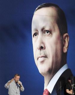 erdogan Turkey's Prime Minister Tayyip Erdogan greets his Justice and Development Party (AKP) supporters during an election rally in Istanbul June 5, 2011. Credit: Reuters/Osman Orsal