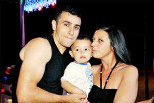 dar.jpg.display HAPPIER TIMES Mehmet Baki Sakaraglu and Anisa with son Amani