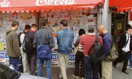 Polish-migrant-workers-re-007 Polish migrant workers in reading job adverts in London: Official predictions that EU enlargement in 2004 would bring an annual net migration of 13,000 were wholly inaccurate. Photograph: Mike Goldwater/Alamy
