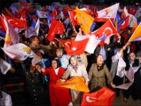get-article-image Supporters of Turkey 's ruling party the Justice and Development Party (AKP) celebrate with party flags after the first results of the parliamentary election in front of party headquarters in Ankara on June 12, 2011. /ADEM ALTAN/AFP/Getty Images