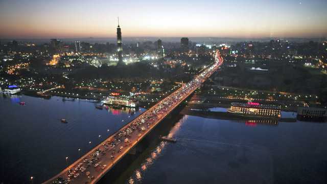 Cars drive on a bridge crossing the Nile River on February 9, 2006 in Central Cairo, Egypt. (Getty Images)
