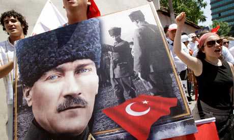 Pro-secular demonstrators in Istanbul carry a portrait of modern Turkey's founder Mustafa Kemal Ataturk. Photograph: Murad Sezer/AP