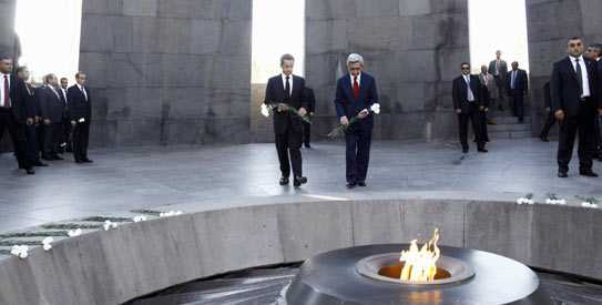 armenia-sarkozy-ap.jpg-543 French President Nicolas Sarkozy, left, and Armenian President Serge Sarkisian lay flowers at the Armenian Genocide Memorial in Yerevan, Armenia. -AP Photo