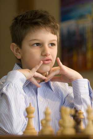 Young chess champ is always on the move