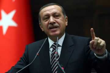 Turkey's Prime Minister Recep Tayyip Erdogan gestures while addressing parliament on the issue of Syria on Nov. 15, 2011. (Adem Altan/AFP/Getty Images)
