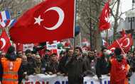 Turks march in Paris to denounce genocide bill