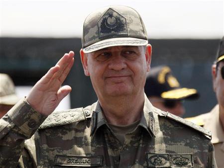 Turkish Chief of Staff General Ilker Basbug salutes during the EFES-2010 military exercise in Izmir