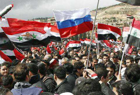 reuters_syria_assad_supporters_480_15march2012