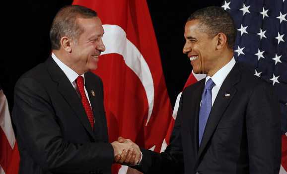 US President Barack Obama (R) shakes hands with Turkey's Prime Minister Recep Tayyip Erdogan after a bilateral meeting ahead of the Nuclear Security Summit in Seoul March 25, 2012. (photo by REUTERS/Larry Downing)