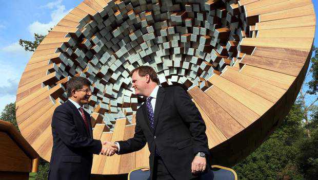 Turkish Minister of Foreign Affairs Ahmet Davutoglu (left) and Canadian Foreign Affairs Minister John Baird.  (Photo credit: The Canadian Press)
