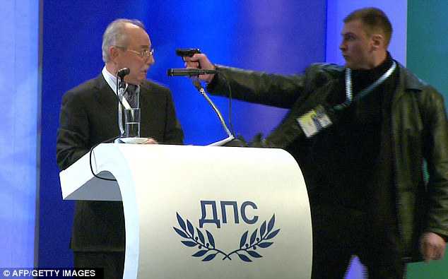 Heartstopping moment would-be assassin aims gun at Bulgarian Turkish leader’s head and pulls the trigger… but victim survives after weapon misfires