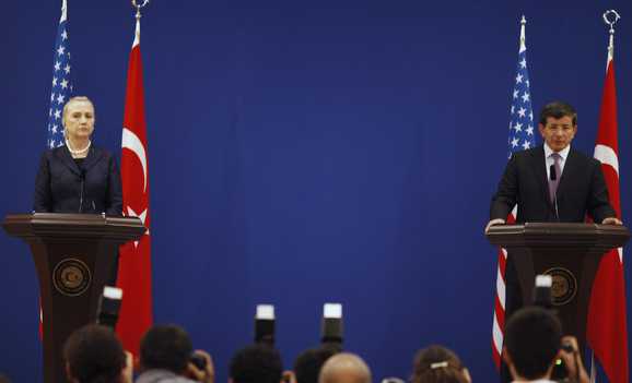 U.S. Secretary of State Clinton and Turkish Foreign Minister Davutoglu attend a news conference