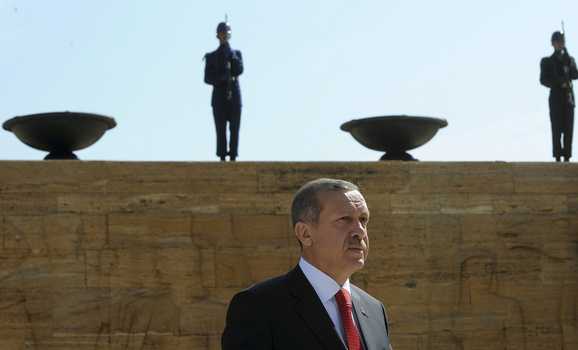 Turkey's Prime Minister Tayyip Erdogan leaves a wreath-laying ceremony at the mausoleum of Mustafa Kemal Ataturk in Ankara