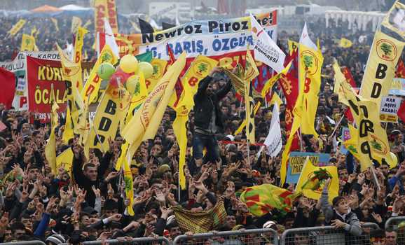 Demonstrators wave pro-Kurdish Peace and Democracy Party flags during a rally to celebrate the spring festival of Nowruz in Istanbul Mar. 17, 2013. (photo by REUTERS/Murad Sezer )