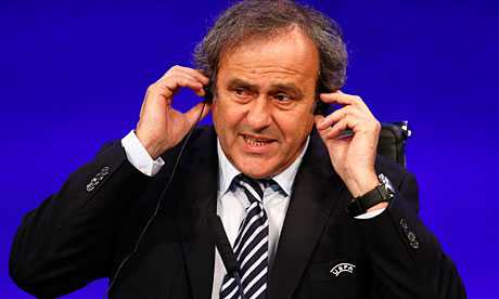 Uefa president Michel Platini was one of the guests at a dinner that was infiltrated by protesters.