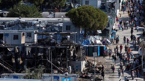 Greece to deport thousands of migrants after deadly camp fire ;Angry protests at ‘power keg’ migrant camp over deadly fire