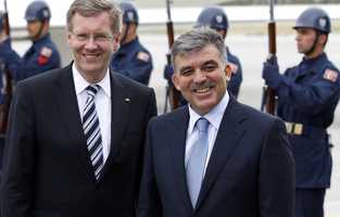 Turkey's President Abdullah Gul and his German counterpart Christian Wulff are seen at the airport upon their arrival in Kayseri