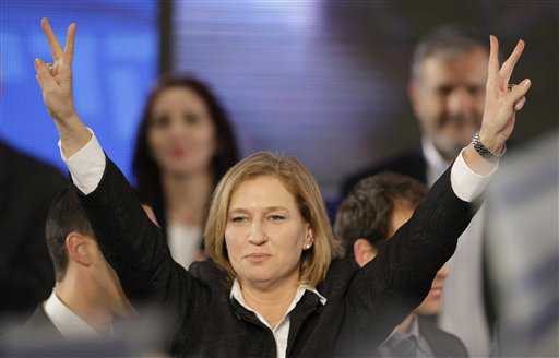 Israel's Foreign Minister and Kadima Party leader Tzipi Livni, reacts during election night rally in Tel Aviv, Israel, early Wednesday morning Feb. 11, 2009. (AP Photo/Ariel Schalit)