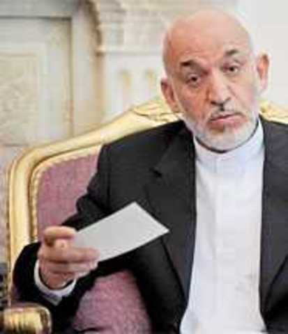 Wikileaks internet sitesinin yayımladığı belgelerde, Afganistan Devlet Başkanı Hamid Karzai'nin, güçlü kişilerle bağlantısı olan uyuşturucu kaçakçısı zanlılarını affettiği, tehlikeli tutukluları serbest bıraktığı öne sürüldü. - 301110 ao karzai